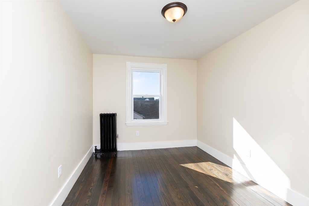 180 Shirley Street, Unit 3 Winthrop, MA 02152 - Photo 15 of 18 a view of a livingroom with wooden floor
