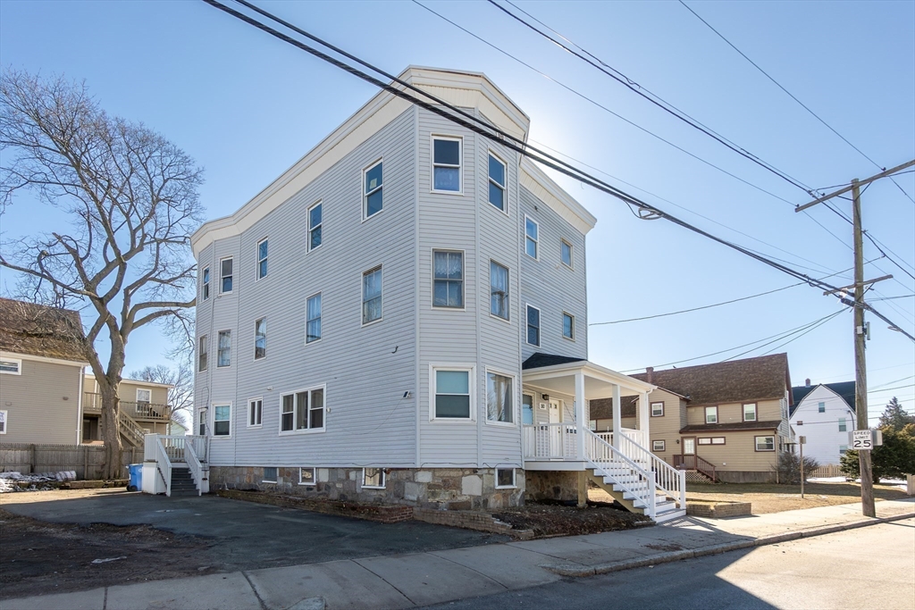 180 Shirley Street, Unit 3 Winthrop, MA 02152 - Photo 17 of 18 a front view of a building with multiple cars
