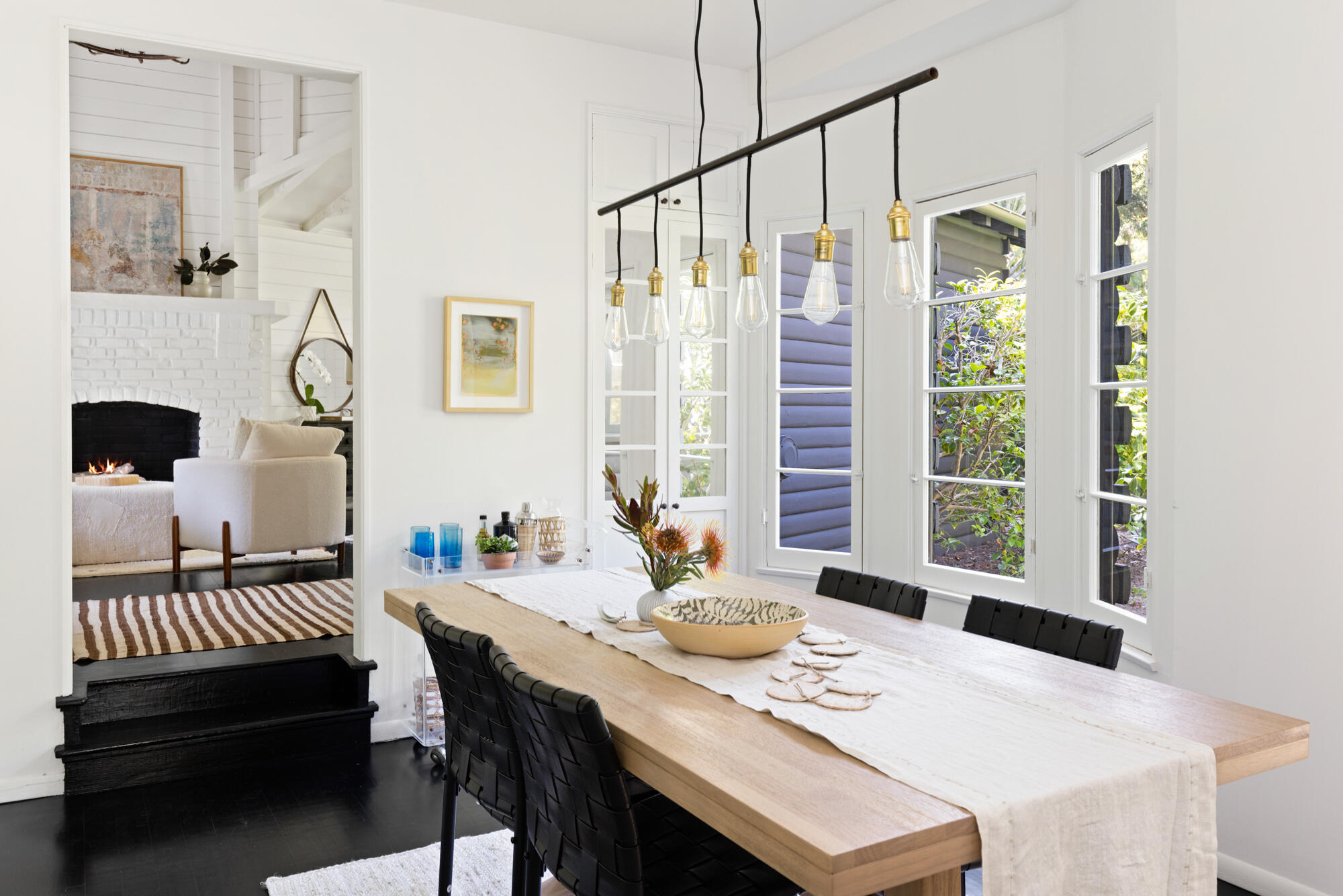 2070 East Valley Road Montecito, CA 93108 - Photo 11 of 34 a view of a dining room with furniture and chandelier