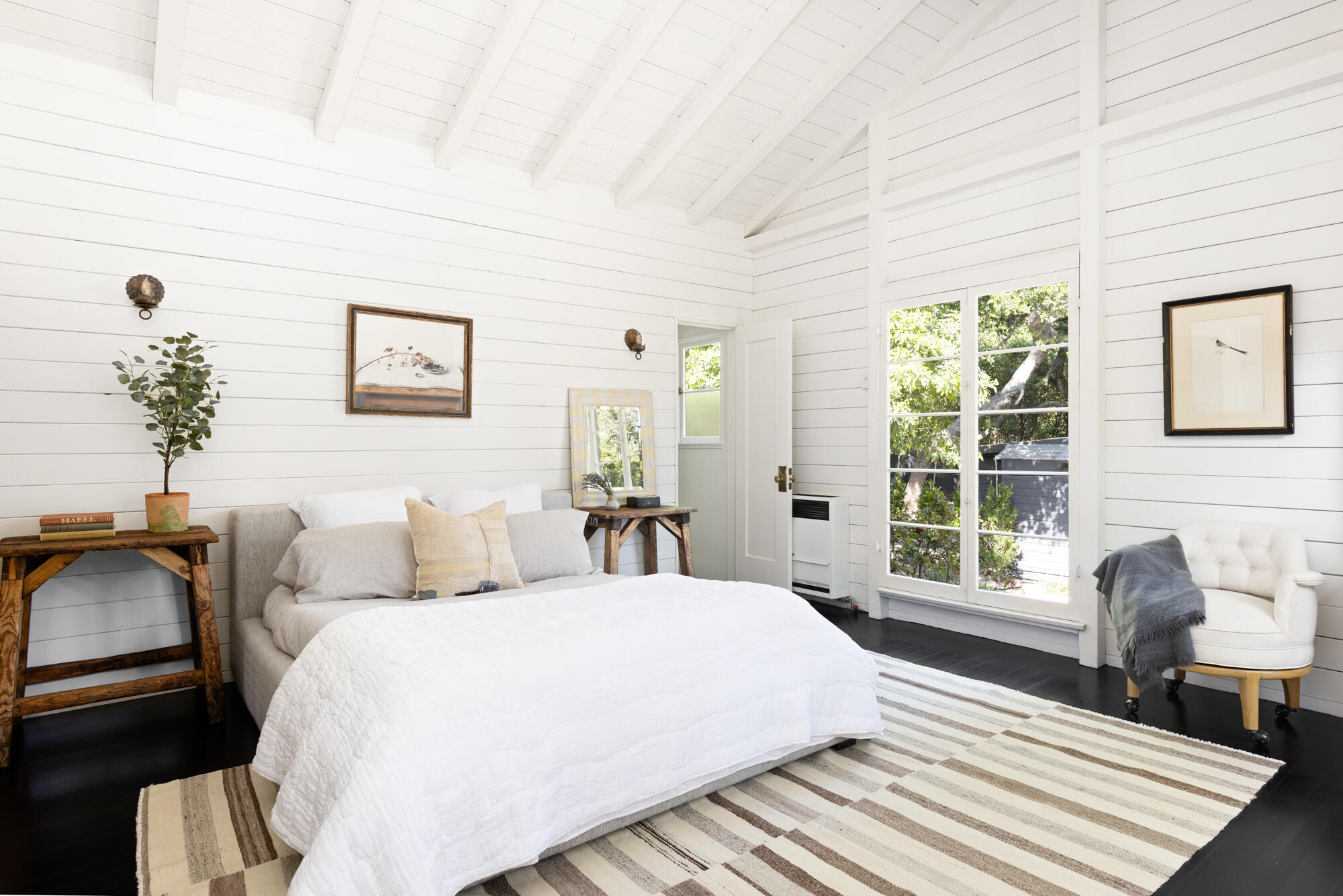 2070 East Valley Road Montecito, CA 93108 - Photo 16 of 34 a bedroom with a bed and a large window