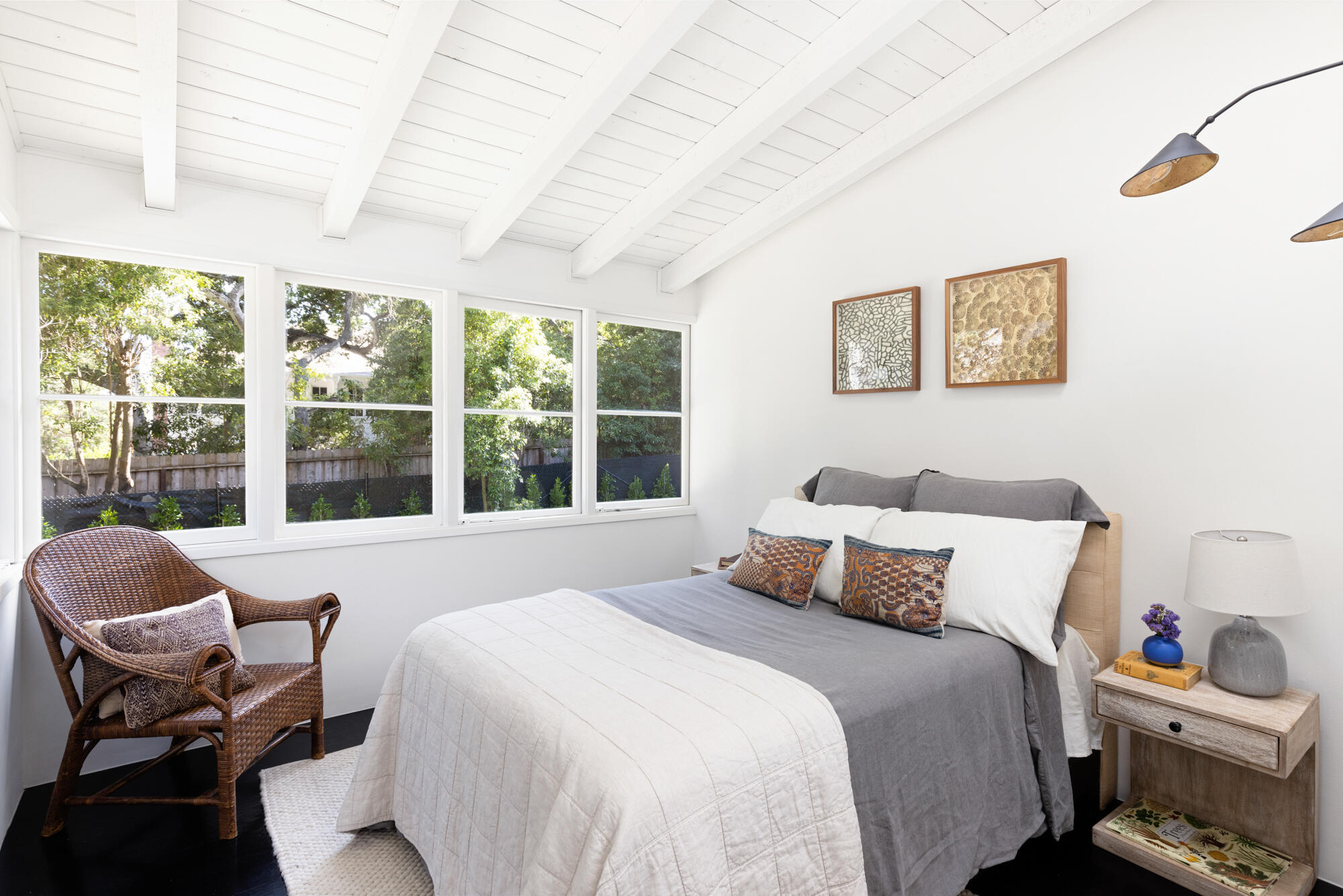 2070 East Valley Road Montecito, CA 93108 - Photo 18 of 34 a bedroom with a bed and wooden floor