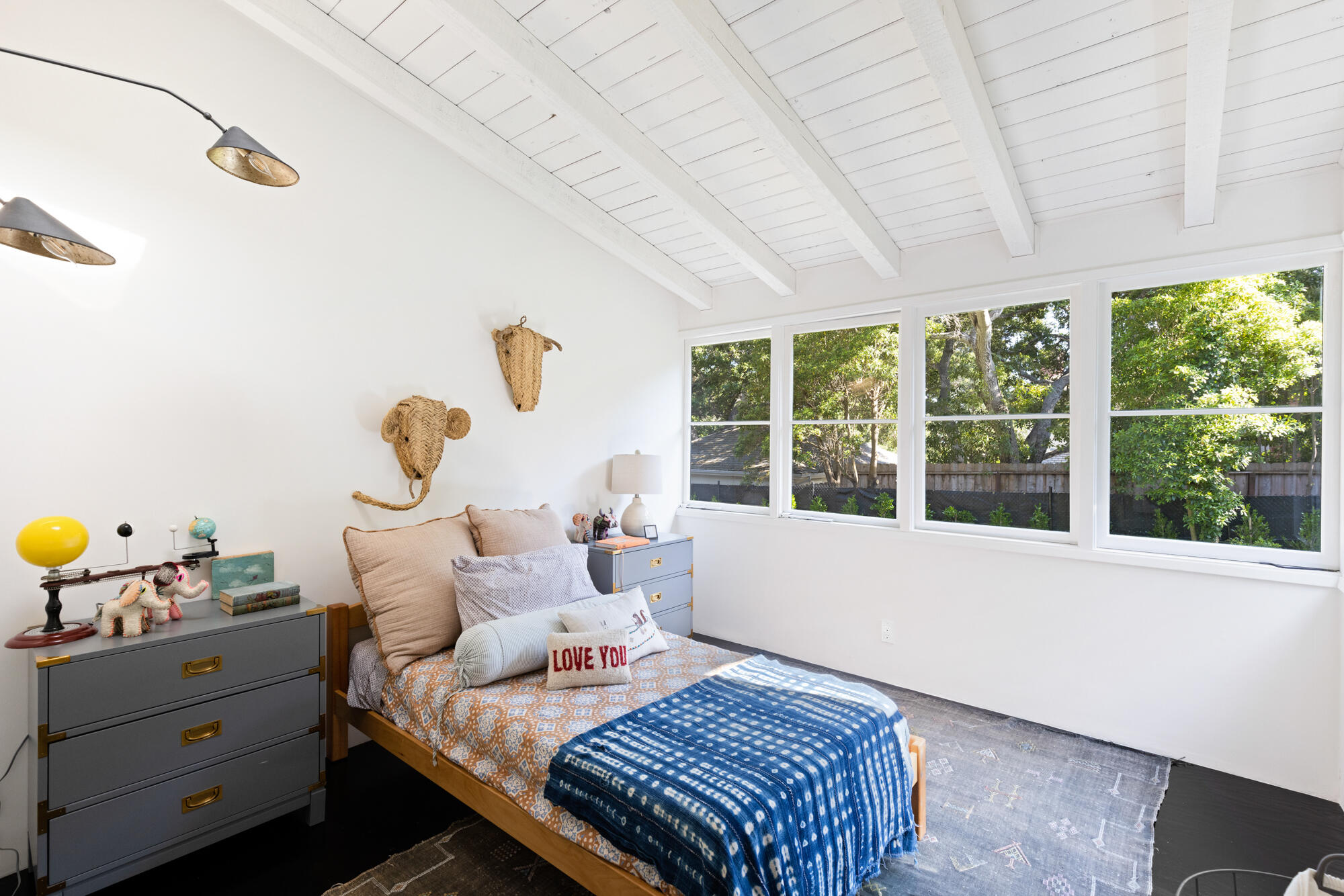 2070 East Valley Road Montecito, CA 93108 - Photo 20 of 34 a bedroom with a bed and wooden floor