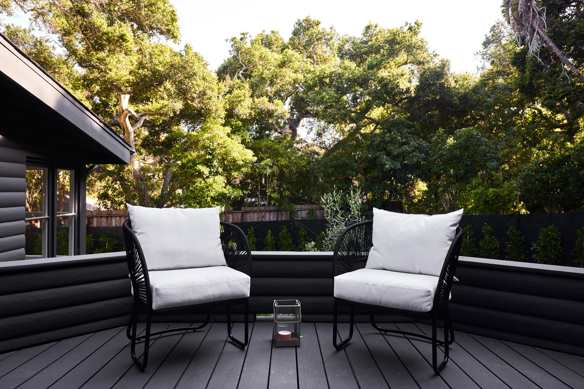 2070 East Valley Road Montecito, CA 93108 - Photo 21 of 34 a balcony with wooden floor and furniture