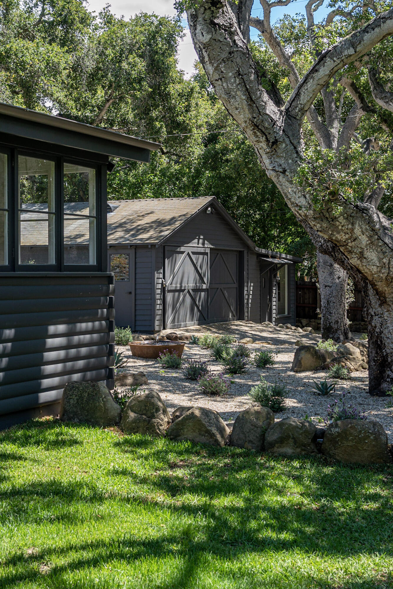 2070 East Valley Road Montecito, CA 93108 - Photo 5 of 34 a front view of a house with a yard