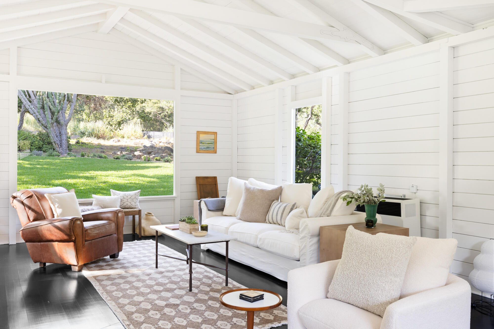 2070 East Valley Road Montecito, CA 93108 - Photo 8 of 34 a living room with furniture and a large window