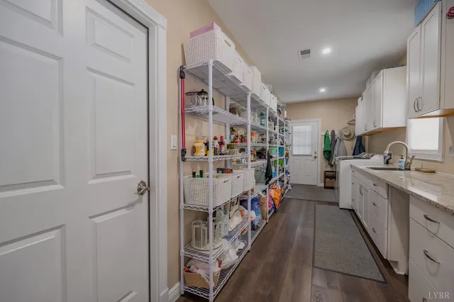 a spacious bedroom with a bed and a walk in closet
