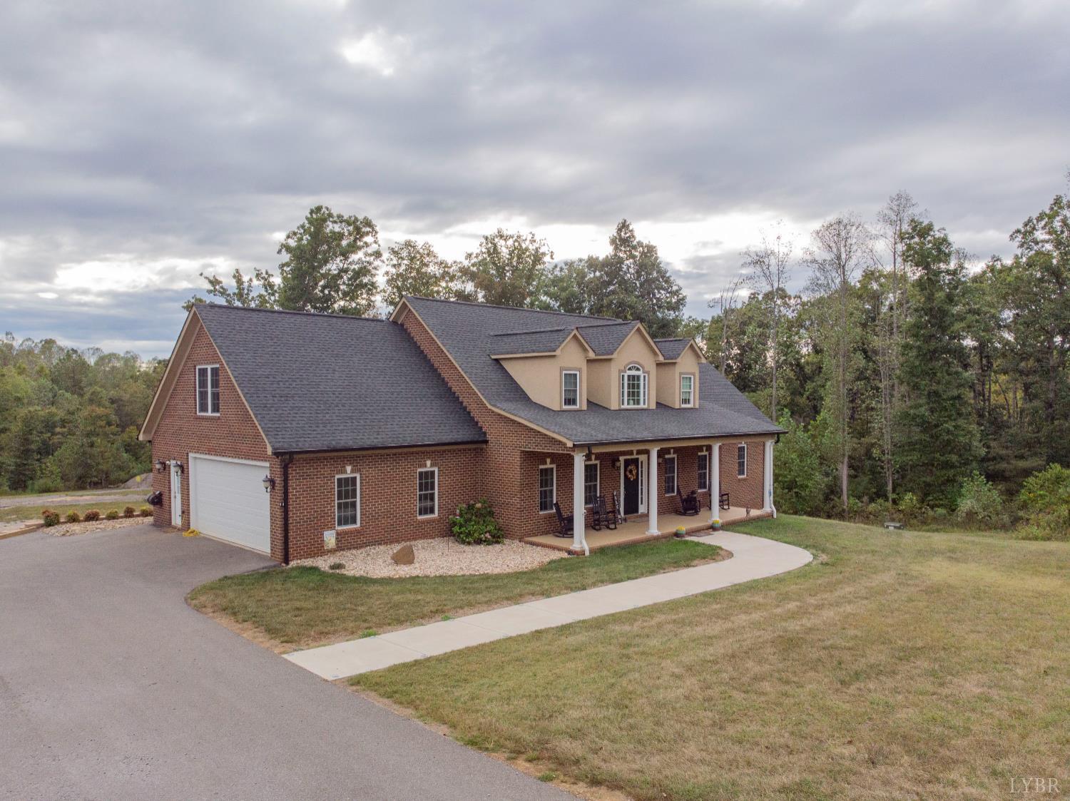 1080 Tranquility Lane Goode, VA 24556 - Photo 40 of 65 front view of a house with a yard