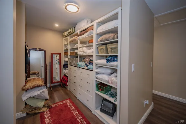 a view of a garage with a bike and a car