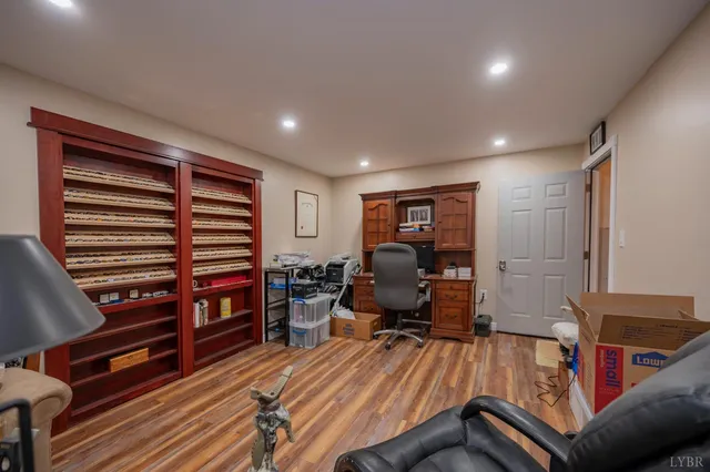 a view of a rural road with plants and trees
