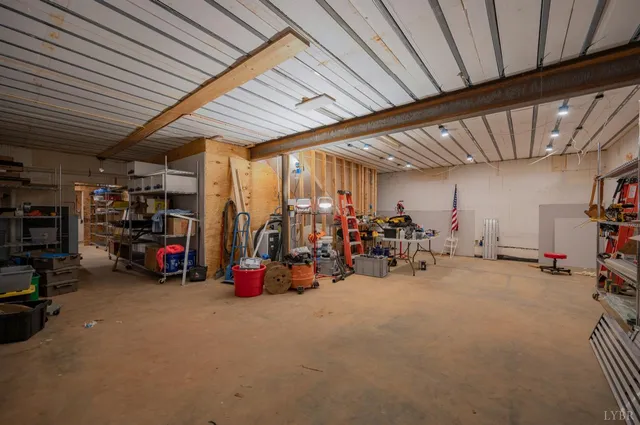 a view of a yard with plants and trees