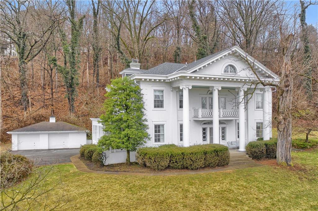 1080 Stanford Road Pittsburgh, PA 15205 - Photo 1 of 24 a front view of a house with a yard