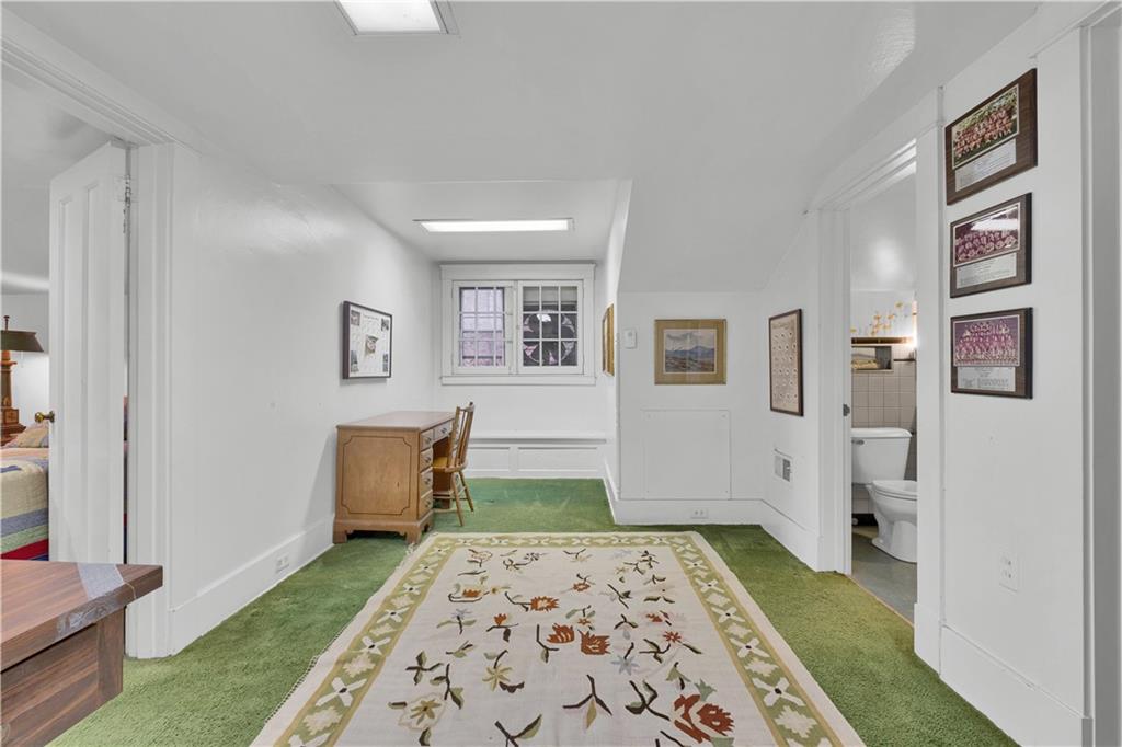 1080 Stanford Road Pittsburgh, PA 15205 - Photo 19 of 24 a bedroom with a bed and a view of bathroom