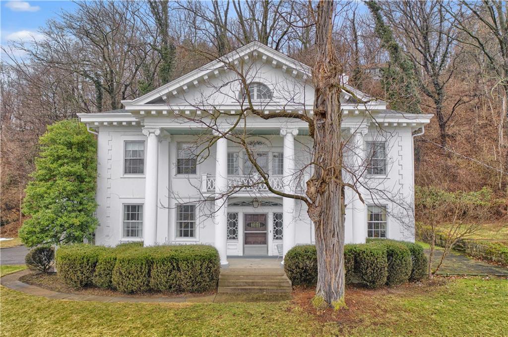 1080 Stanford Road Pittsburgh, PA 15205 - Photo 2 of 24 a front view of a house with garden