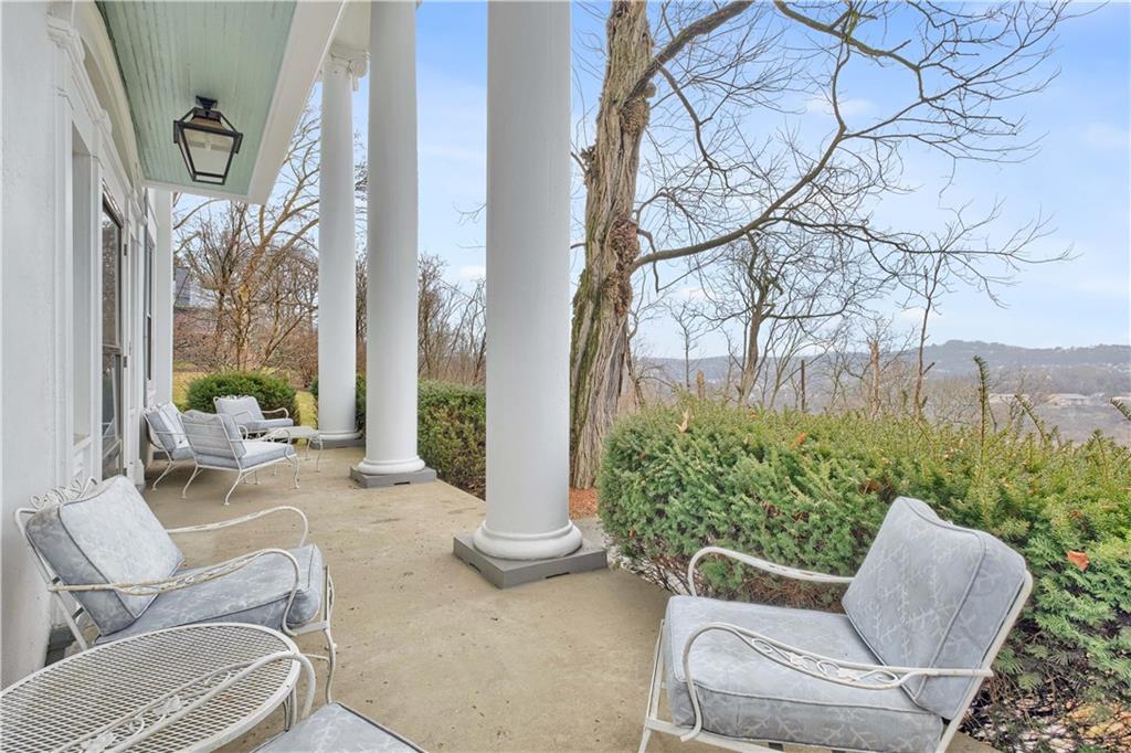 1080 Stanford Road Pittsburgh, PA 15205 - Photo 22 of 24 a outdoor living space with furniture and a potted plant