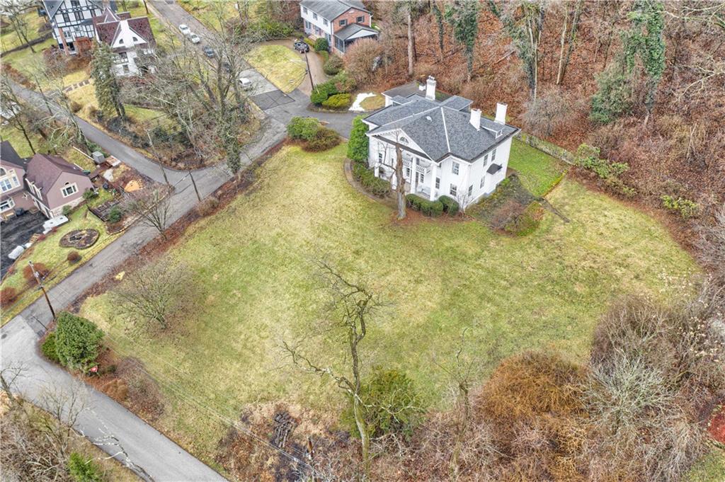 1080 Stanford Road Pittsburgh, PA 15205 - Photo 24 of 24 a white house sitting next to a yard