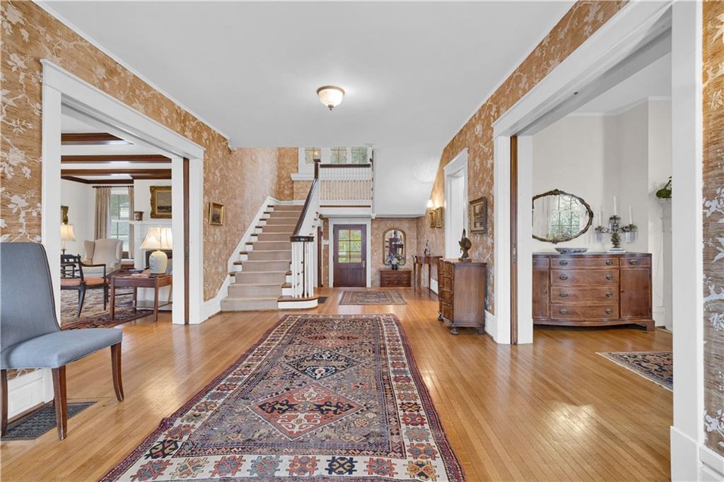 1080 Stanford Road Pittsburgh, PA 15205 - Photo 4 of 24 a view of living room and kitchen with wooden floor