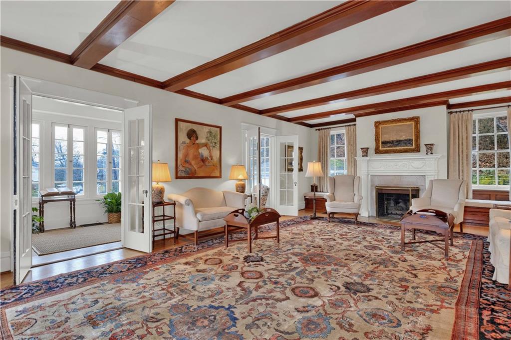 1080 Stanford Road Pittsburgh, PA 15205 - Photo 6 of 24 a living room with furniture large window and a fireplace
