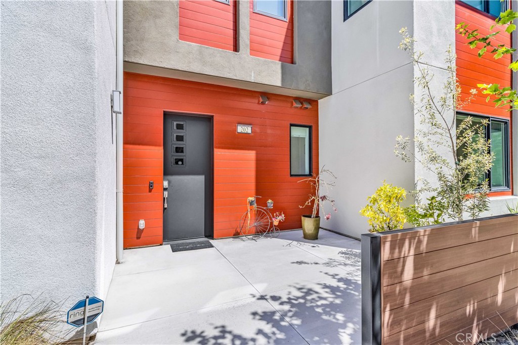 202 Waypoint Tustin, CA 92782 - Photo 2 of 46 a view of a entryway door of the house