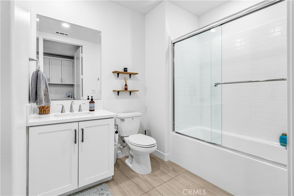 202 Waypoint Tustin, CA 92782 - Photo 29 of 46 a bathroom with a sink toilet and shower