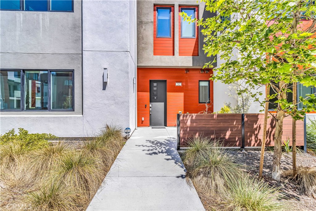 202 Waypoint Tustin, CA 92782 - Photo 3 of 46 a front view of a house
