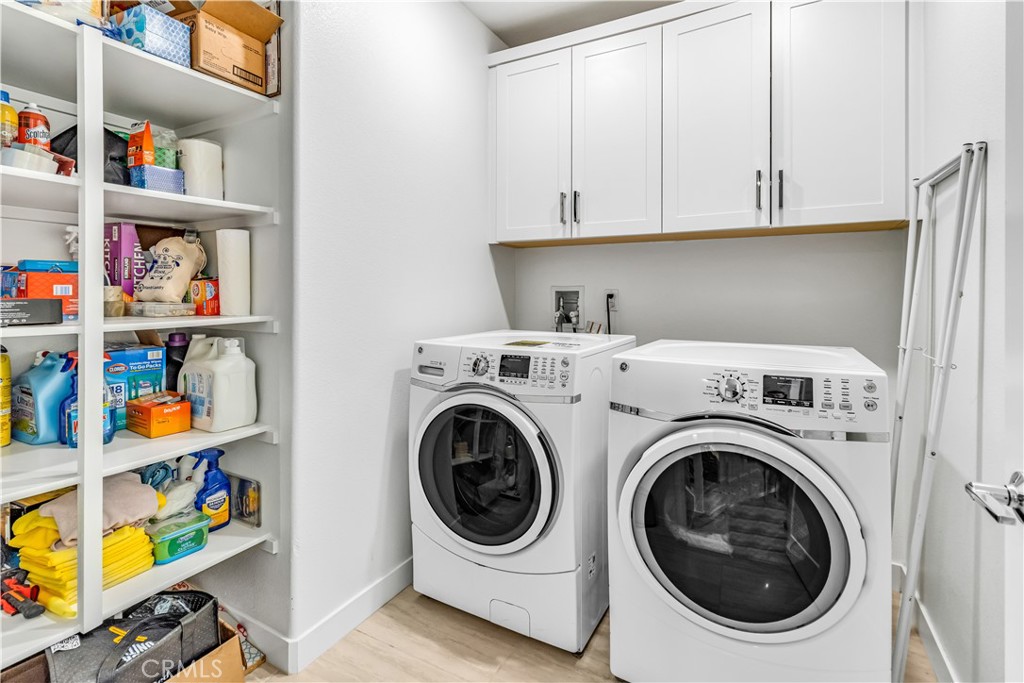 202 Waypoint Tustin, CA 92782 - Photo 36 of 46 a utility room with dryer and washer