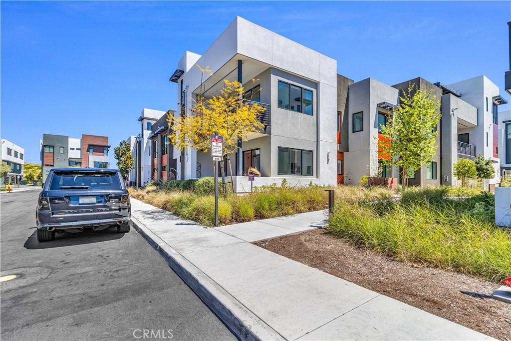 202 Waypoint Tustin, CA 92782 - Photo 4 of 46 a view of a house with a park