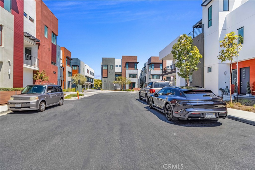 202 Waypoint Tustin, CA 92782 - Photo 5 of 46 a car parked in front of a building