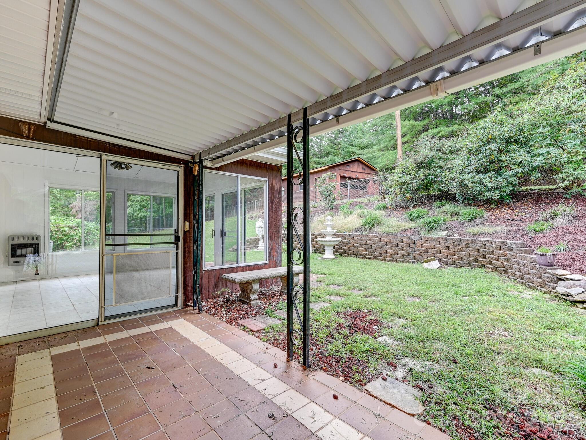 651 Case Cove Road Candler, NC 28715 - Photo 20 of 45 a view of a porch with a backyard