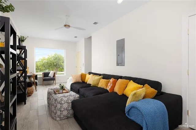a living room with furniture and a window