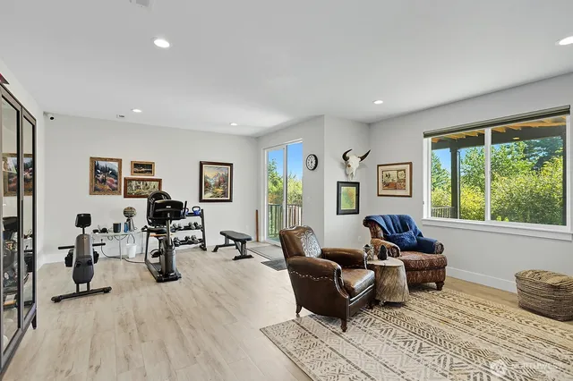 a living room with furniture and a window