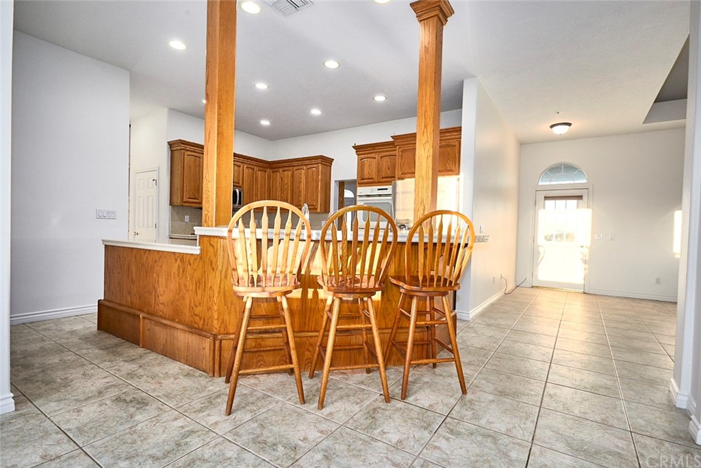 8250 Cataba Road Oak Hills, CA 92344 - Photo 14 of 53 a view of a dining room with furniture