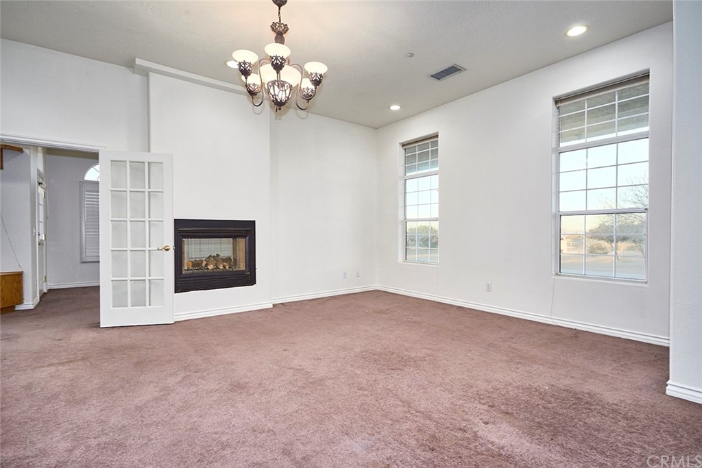 8250 Cataba Road Oak Hills, CA 92344 - Photo 18 of 53 a view of an empty room with a window