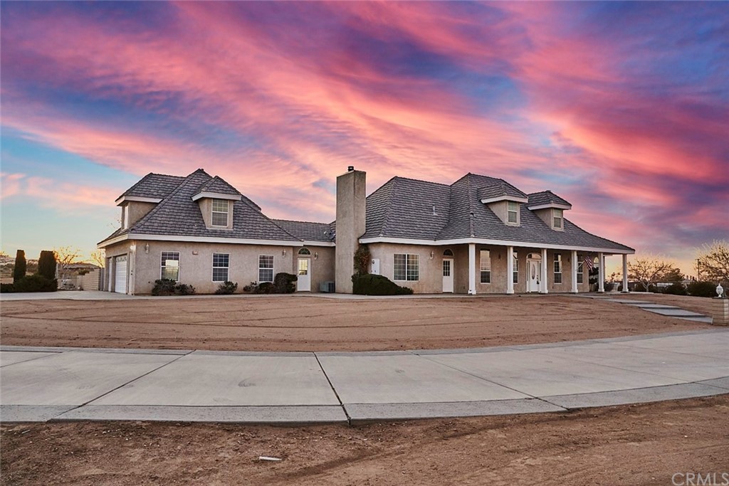 8250 Cataba Road Oak Hills, CA 92344 - Photo 2 of 53 front view of a house with a street