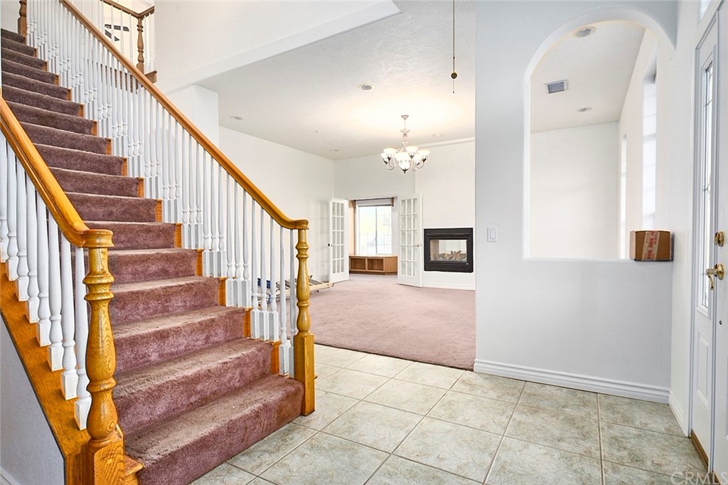 8250 Cataba Road Oak Hills, CA 92344 - Photo 21 of 53 a view of entryway and hall with wooden floor
