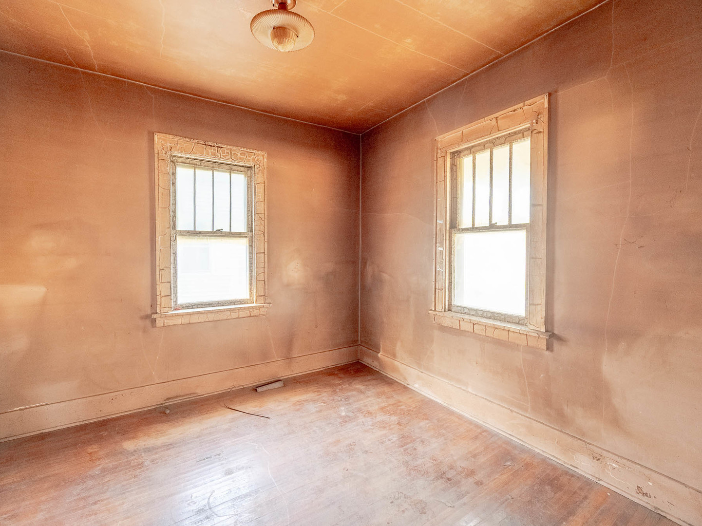 867 Church Road Aurora, IL 60505 - Photo 2 of 12 an empty room with windows