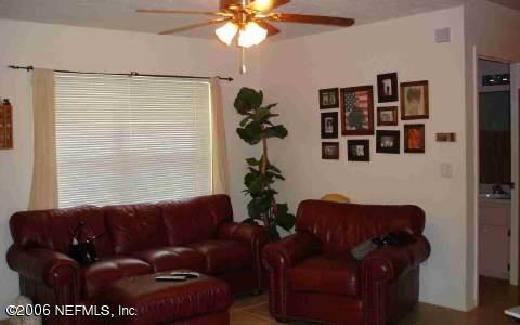12819 Southwest 61st Place Road Ocala, FL 34481 - Photo 2 of 4 Living Room