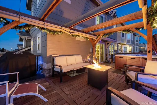 a view of a chairs and table on the deck