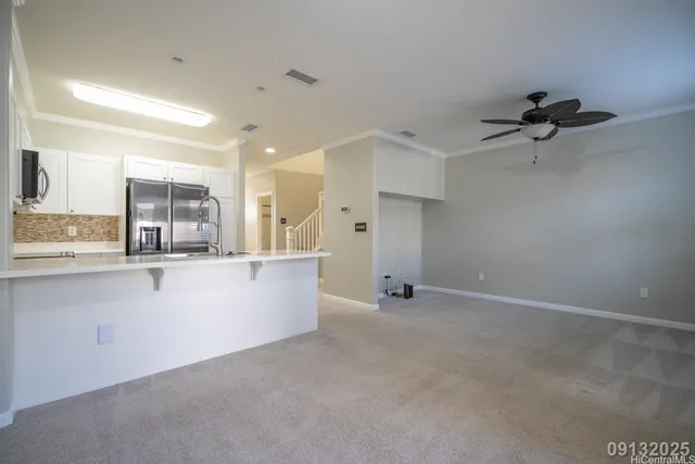 a view of a kitchen with a sink