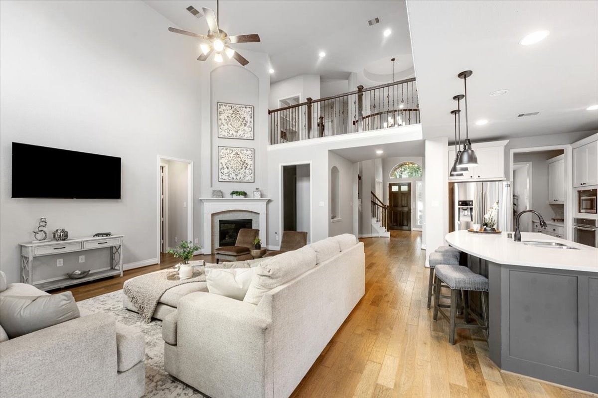 18843 Collins View Drive New Caney, TX 77357 - Photo 12 of 50 This house offers open concept between kitchen, living, and breakfast, paired with high ceilings and bright windows, it makes for warm and bright way to start your day
