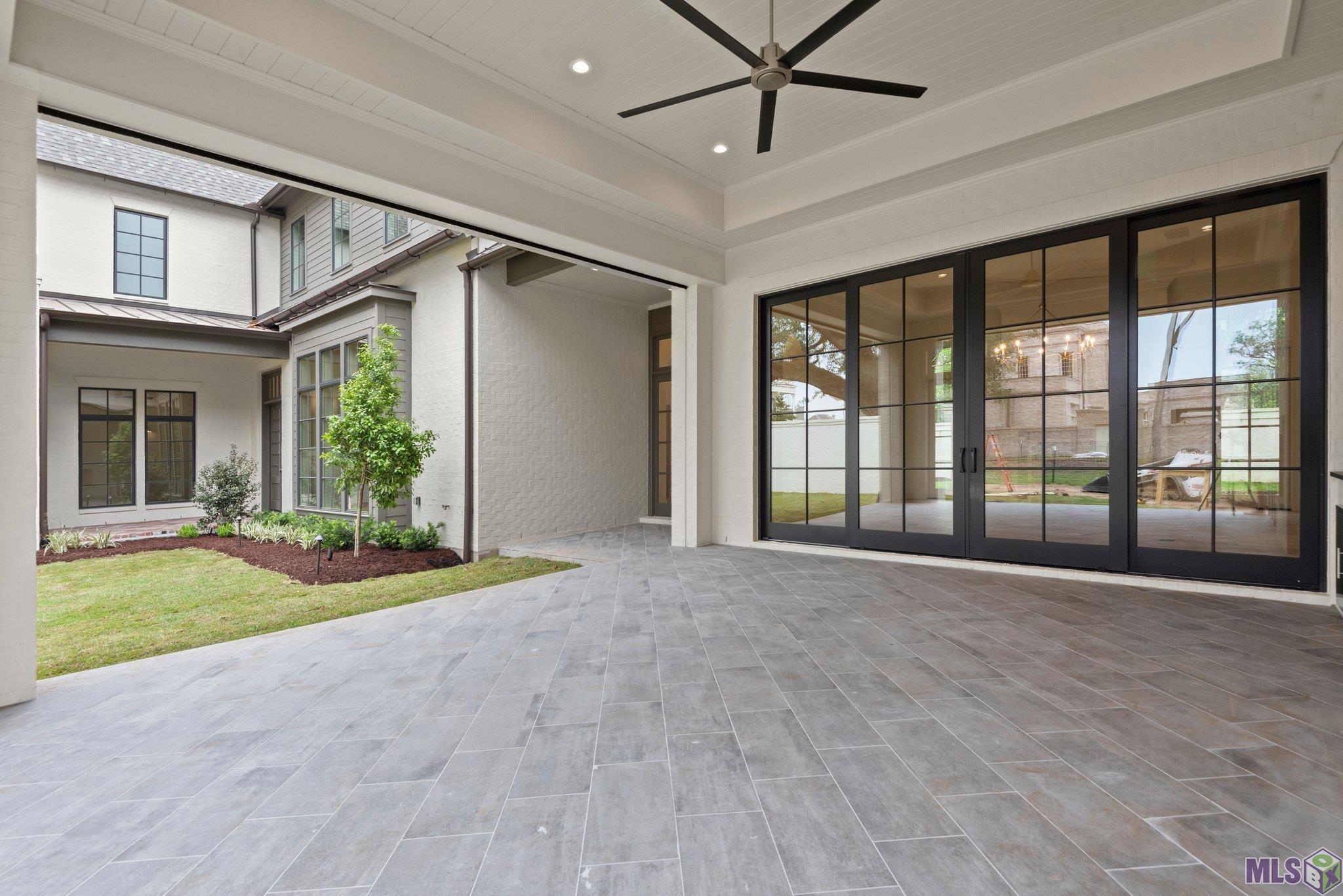 7208 Adelia Lane Baton Rouge, LA 70806 - Photo 31 of 47 Porch with remote screens and outdoor kitchen
