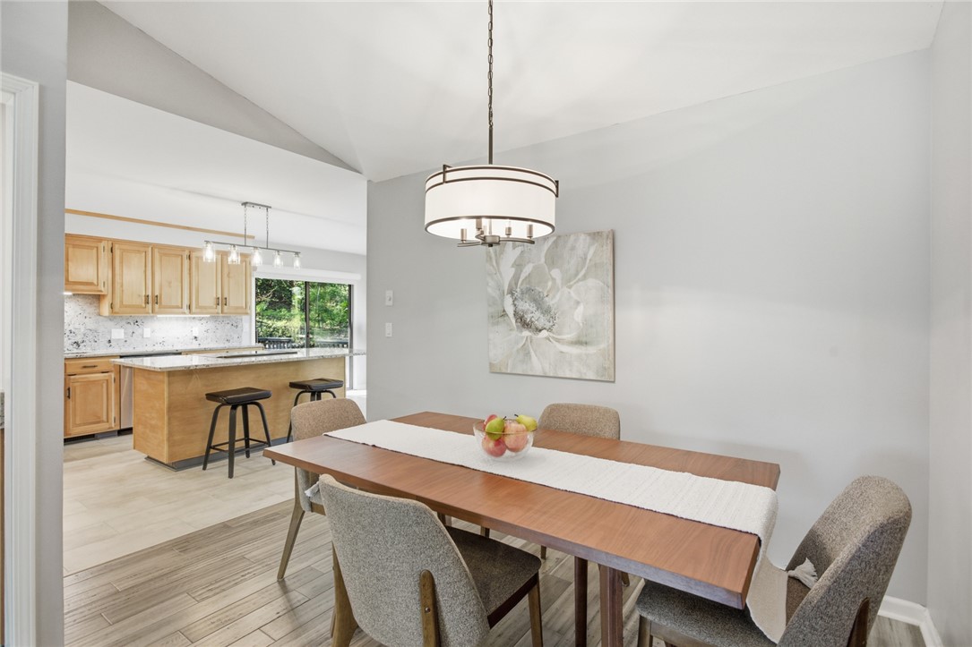 9 Tradewinds Way Salem, SC 29676 - Photo 16 of 45 This bright dining area features an open concept layout, connecting to a functional kitchen.