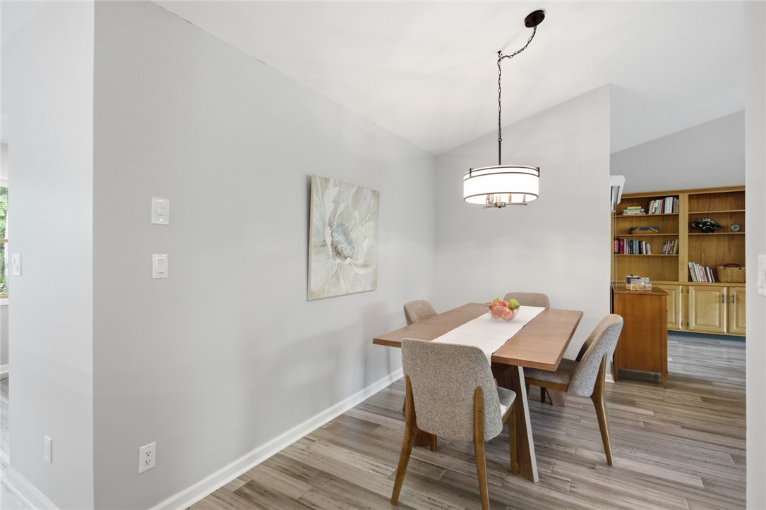 9 Tradewinds Way Salem, SC 29676 - Photo 17 of 45 This inviting dining area features elegant flooring and a warm, welcoming ambiance for gatherings.
