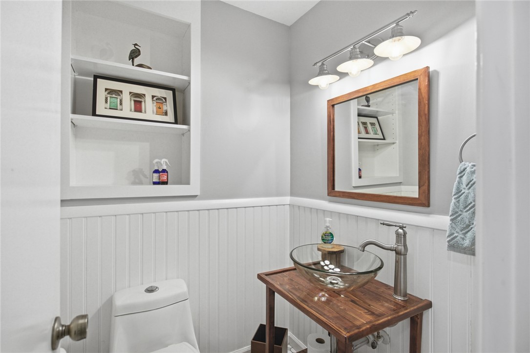9 Tradewinds Way Salem, SC 29676 - Photo 19 of 45 This half bathroom offers a unique vessel sink and charming built-in shelving.