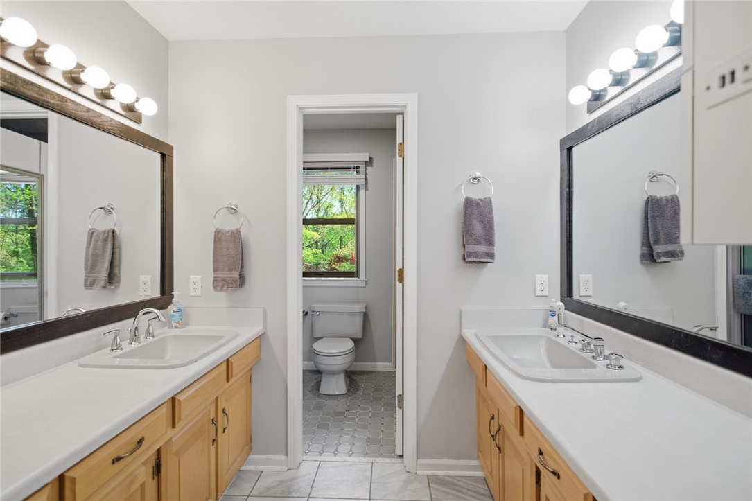 9 Tradewinds Way Salem, SC 29676 - Photo 23 of 45 This bathroom features dual vanities and a convenient private toilet area.