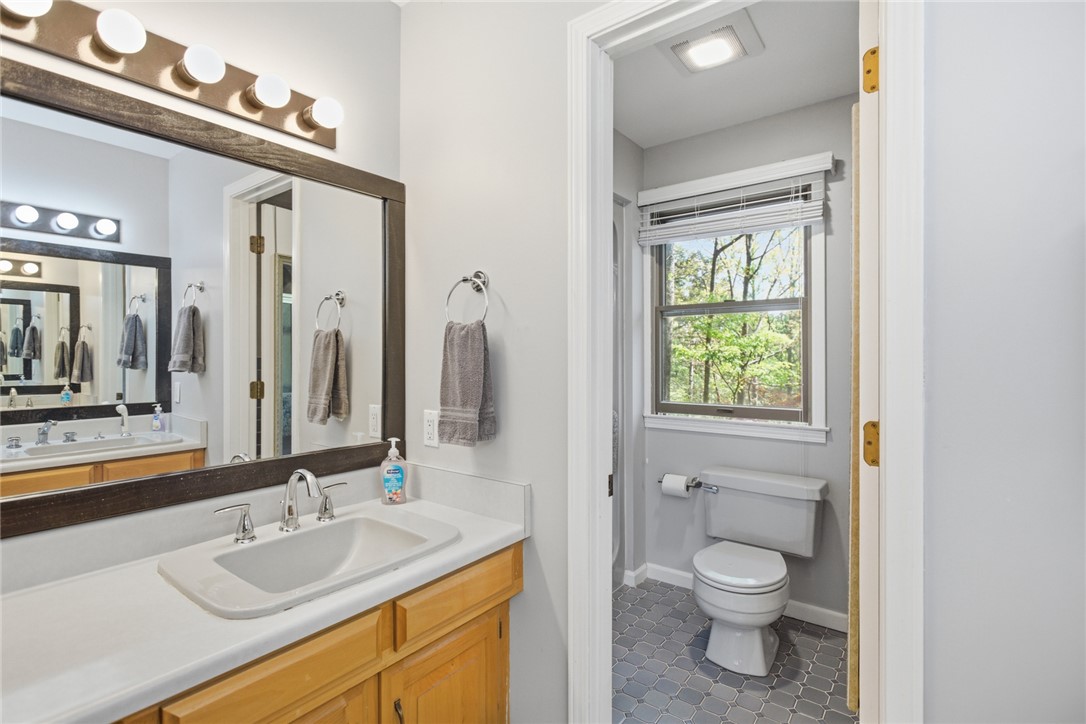 9 Tradewinds Way Salem, SC 29676 - Photo 24 of 45 This bright bathroom features a spacious vanity with ample counter space and a window offering natural light.