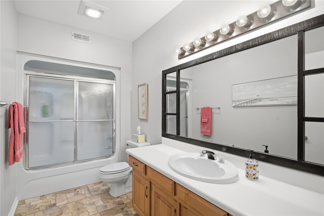 9 Tradewinds Way Salem, SC 29676 - Photo 29 of 45 Guest bathroom features a sleek vanity and a practical shower-over-tub design.