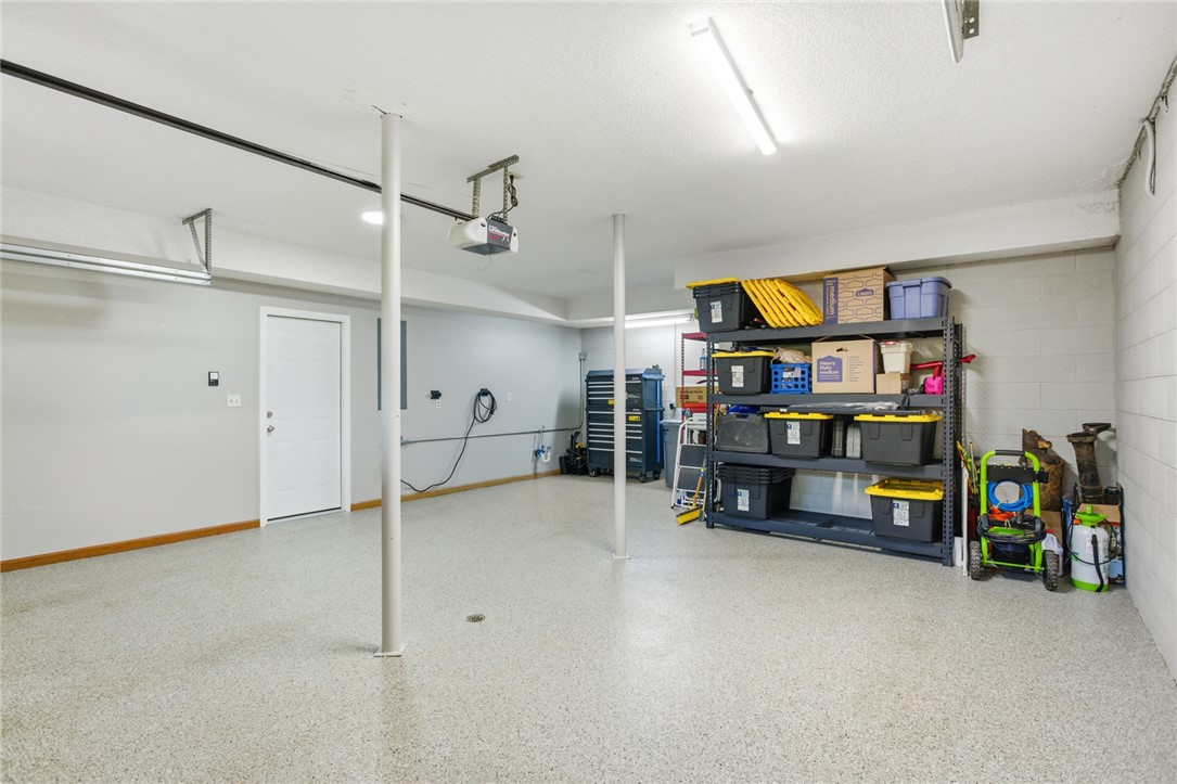 9 Tradewinds Way Salem, SC 29676 - Photo 32 of 45 This spacious garage offers versatile space for vehicles and storage, perfect for organization.