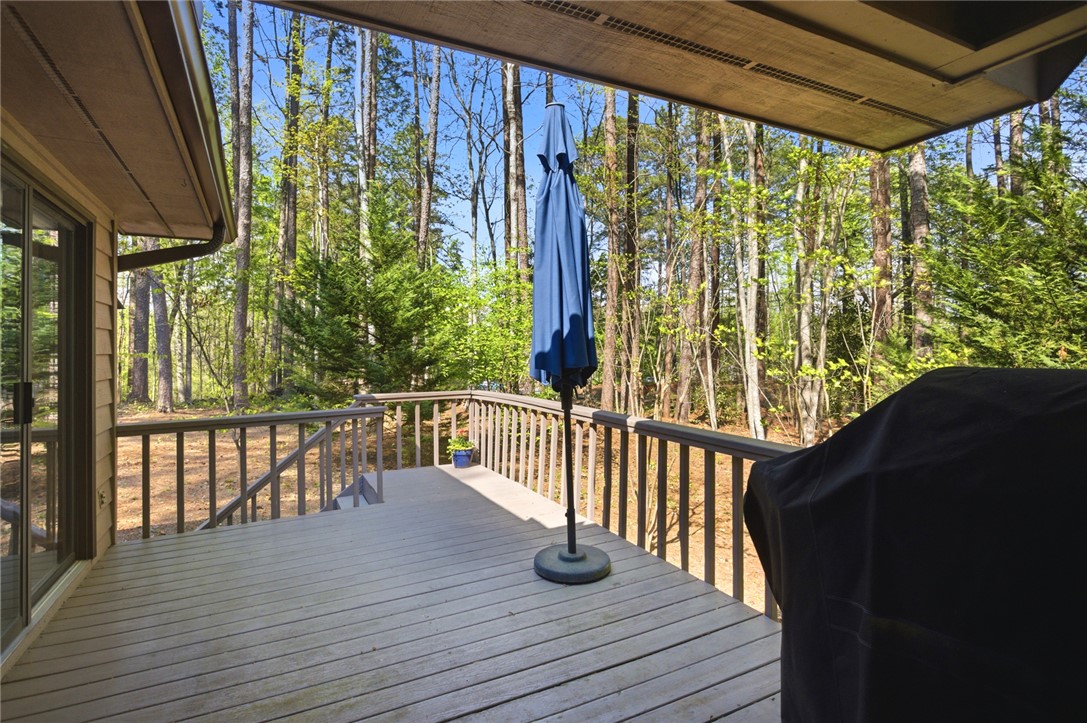 9 Tradewinds Way Salem, SC 29676 - Photo 36 of 45 This spacious deck offers a tranquil retreat surrounded by lush greenery and natural beauty.