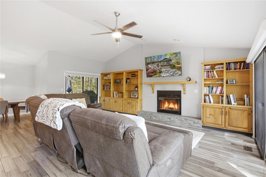 9 Tradewinds Way Salem, SC 29676 - Photo 6 of 45 This inviting living space features vaulted ceilings and a cozy fireplace, and wet bar perfect for relaxing or entertaining.