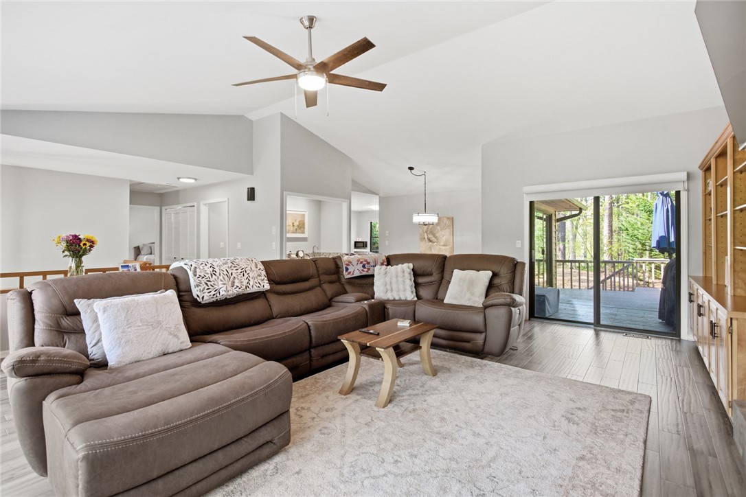 9 Tradewinds Way Salem, SC 29676 - Photo 8 of 45 This bright living area features vaulted ceilings and direct outdoor access.